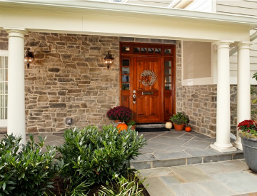 Stone veneers are a beautiful option for your home's exterior. complete the look with the perfect grout color. Source: Houzz